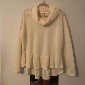 Cream Sweater with Loose Turtleneck neckline